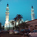 City skyline at night in the Middle East